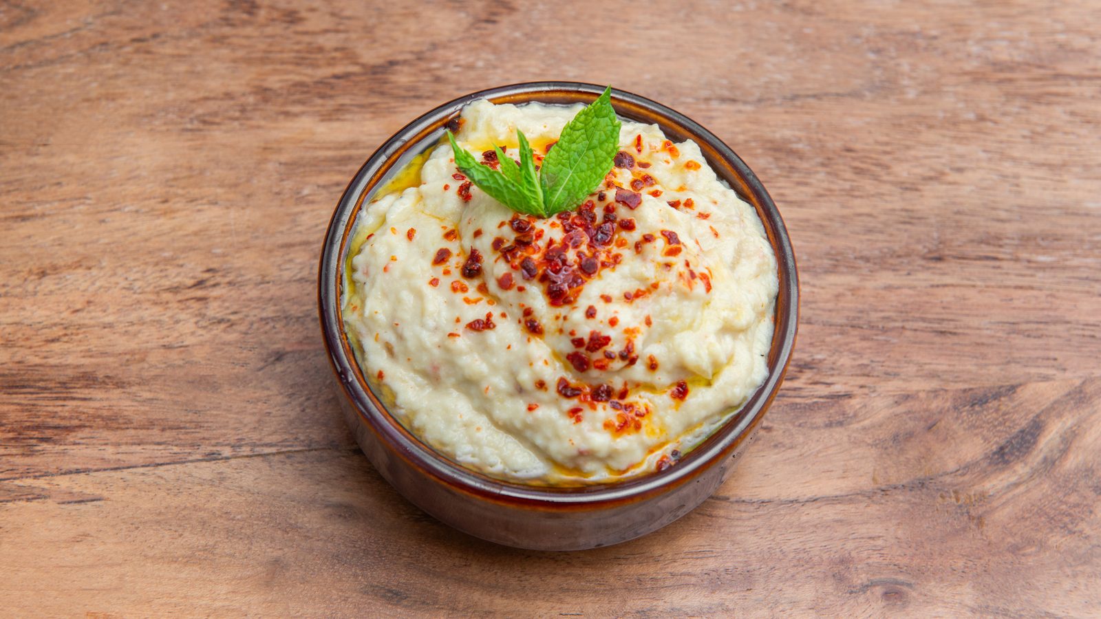 Baba ghanoush in a ceramic pot