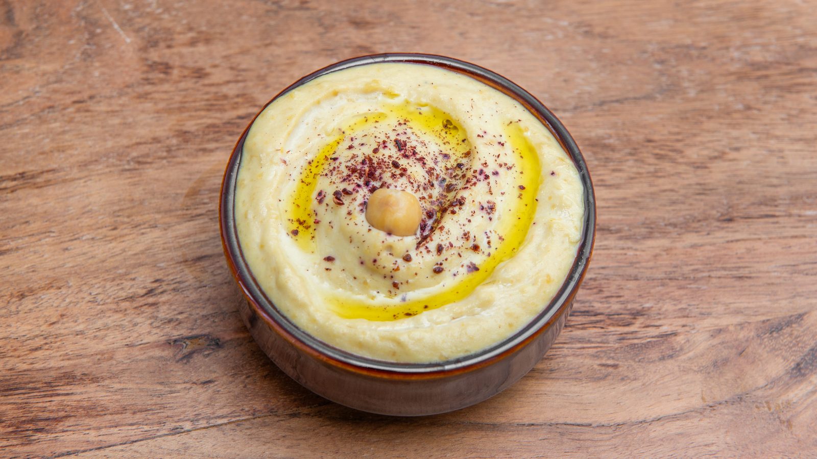 Hummus in a ceramic pot